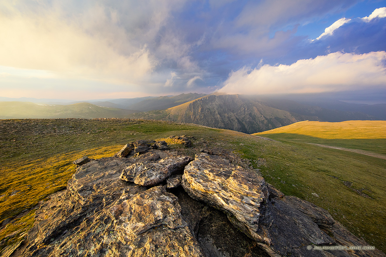For almost an hour I watched as the clouds danced along the tops of the Mummy Range in the northern area of Rocky Mountain National Park.  The sun slowly set in the west casting long shadows along the tundra. - Colorado Picture