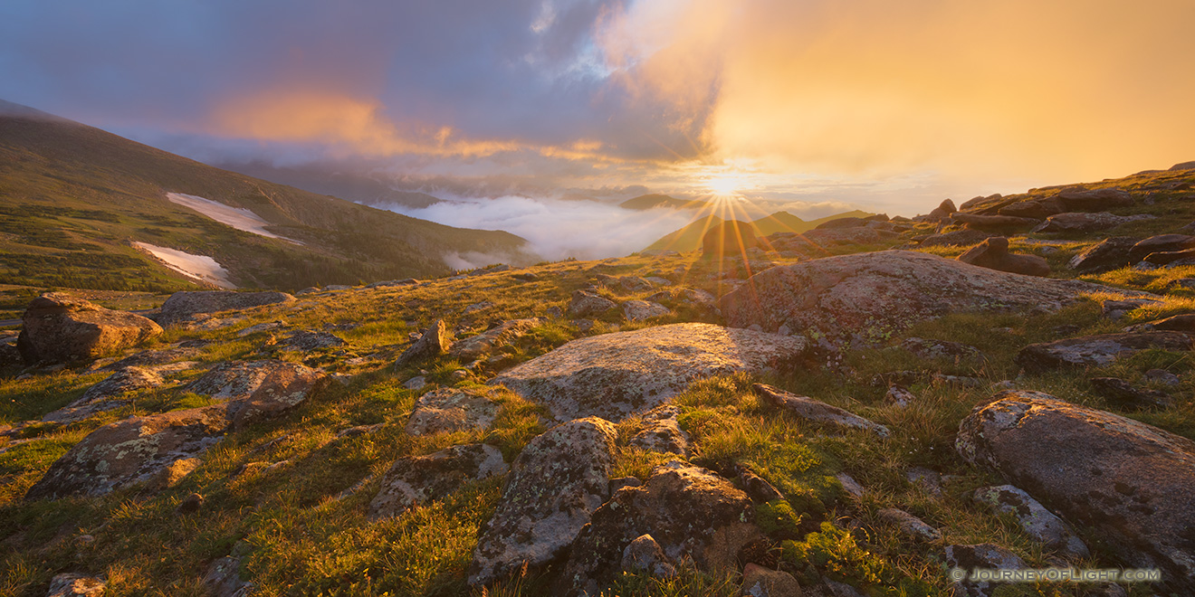 A photograph of a beautiful sunrise on the tundra landscape of Rocky Mountain National Park in Colorado. - Colorado Picture