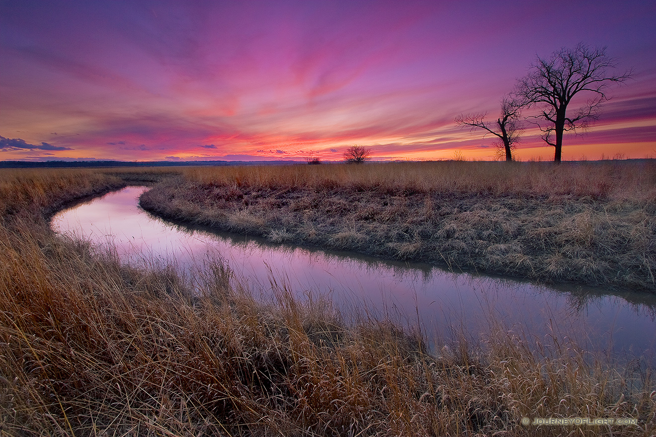 A small chute flows toward an early spring sunset through a tract of native prairie grasses at Boyer Chute National Wildlife Refuge near Ft. Calhoun. - Boyer Chute Picture