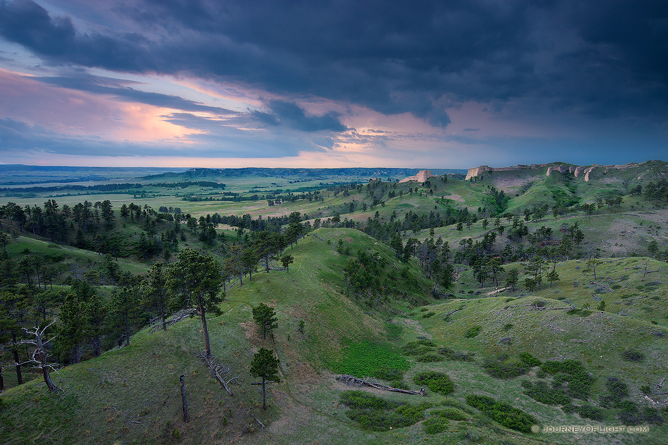 Clouds form in the evening over Ft. Robinson State Park in northwestern Nebraska.  Originally, a U.S. Army fort it has a checkered history in regards to the conflicts with Native Americans in the late 1800s. - Nebraska Picture