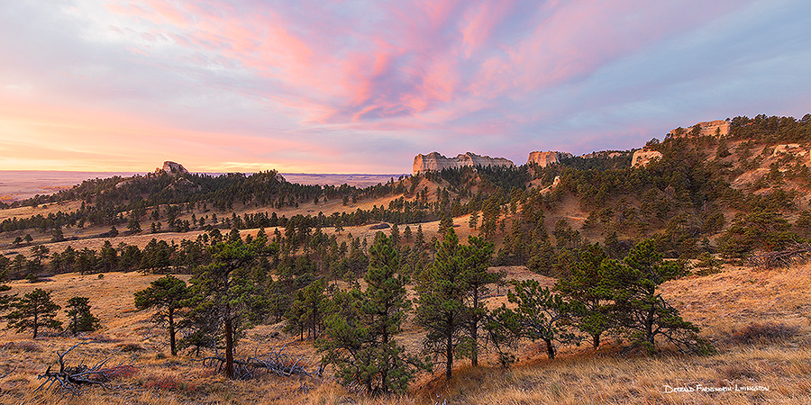 A scenic landscape photograph of a beautiful sunrise over Fort Robinson State Park in Northwestern Nebraska. - Nebraska Photography