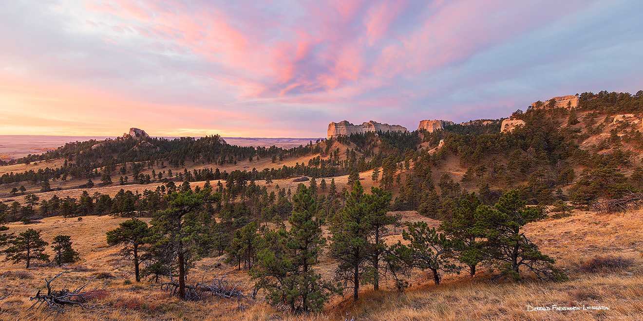 A scenic landscape photograph of a beautiful sunrise over Fort Robinson State Park in Northwestern Nebraska. - Nebraska Picture